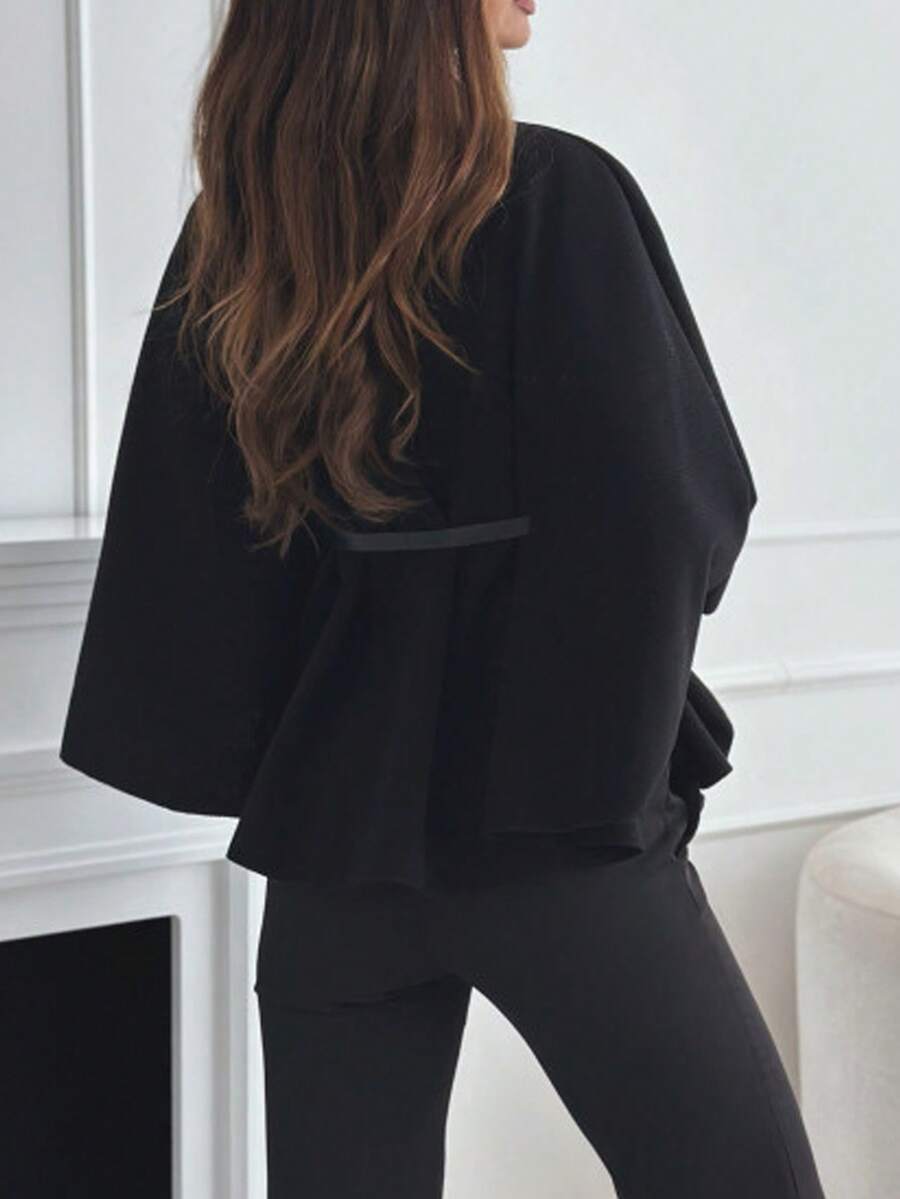 Un manteau court élégant et à la mode de couleur unie - Floorah