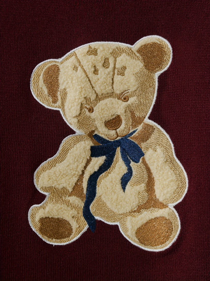 Pull-over chic à motif ourson – Élégant et doux