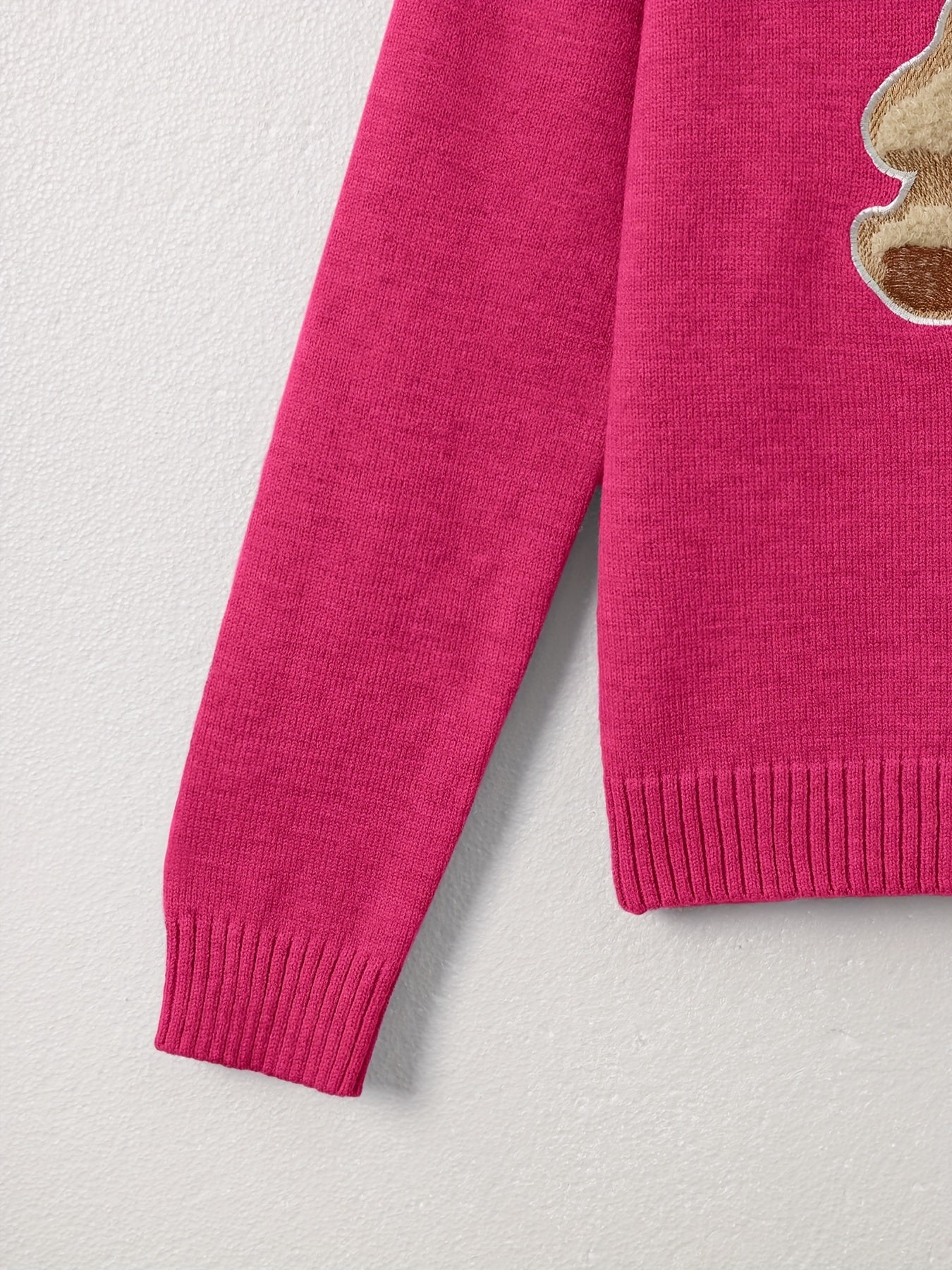 Pull-over chic à motif ourson – Élégant et doux