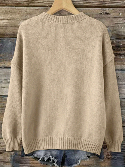 Pull femme motif ourson – Beige et bleu marine