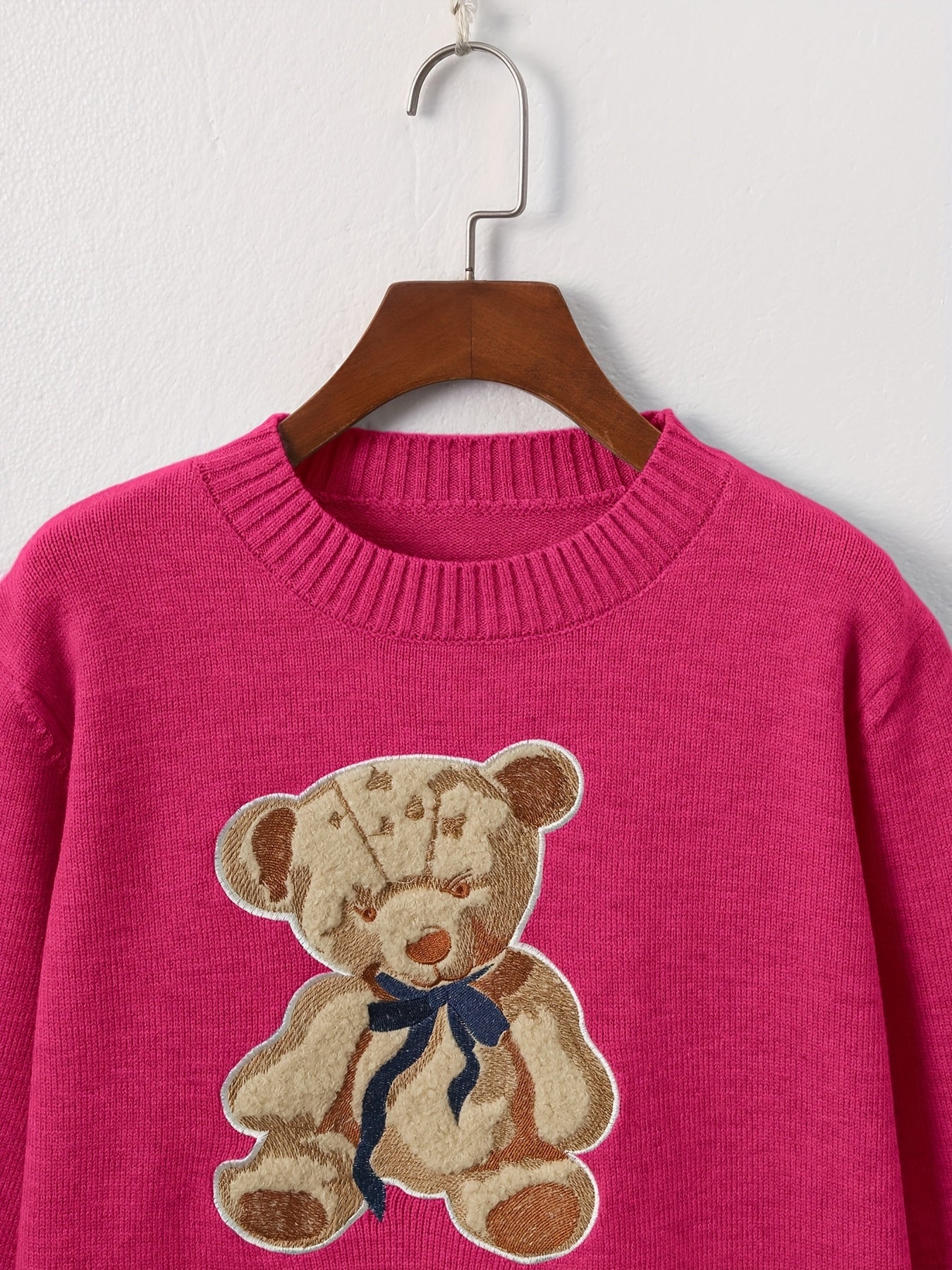 Pull-over chic à motif ourson – Élégant et doux