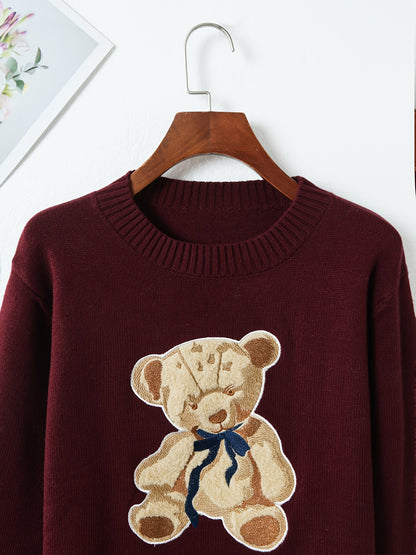 Pull-over chic à motif ourson – Élégant et doux